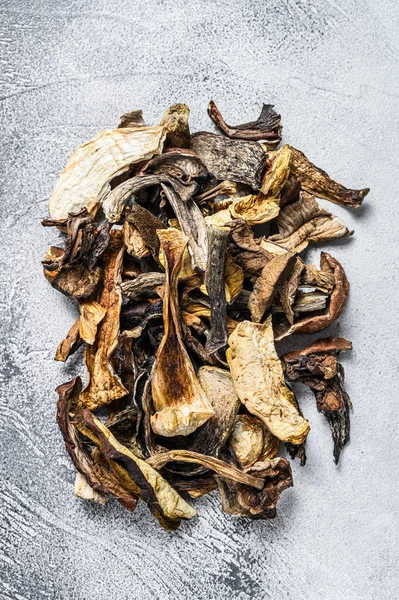 Mixed wild dried mushrooms. White background. Top view — Stock Photo, Image