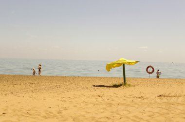 Sandy plaj şemsiye ile