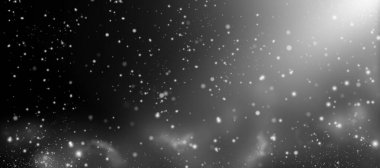 Siyah arka planda odaksız beyaz ışıklar. Altın bokeh.