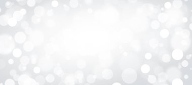 Gri arka planda odaksız beyaz ışıklar. Beyaz arka planda soyut bir bokeh. Parlak ve pırıl pırıl bir arka plan.