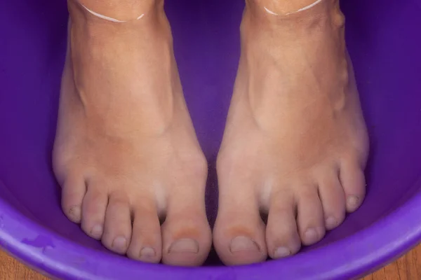 Feet in hot water,foot bath — Stok fotoğraf