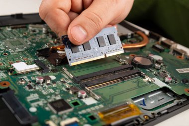 installing RAM in a laptop, laptop repair.