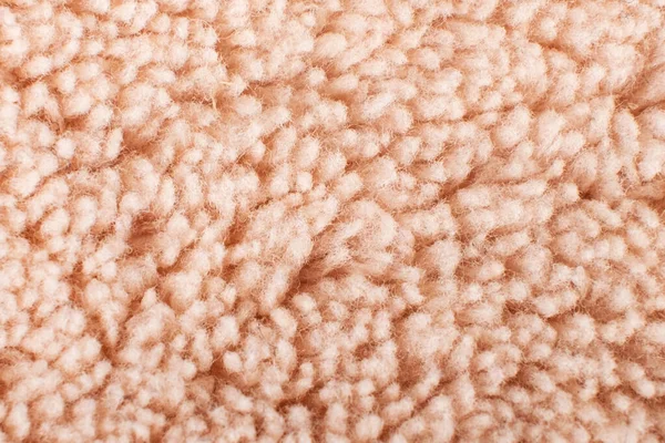 Текстура бежевого вовняного макросу, текстильного синтетичного фону — стокове фото
