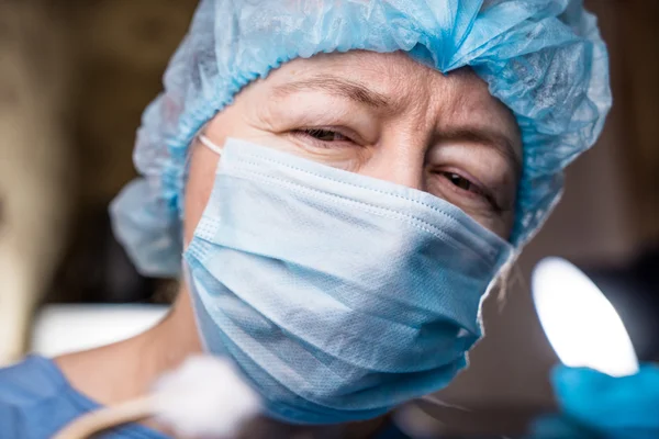 Female dentist with tools — Stock Photo, Image