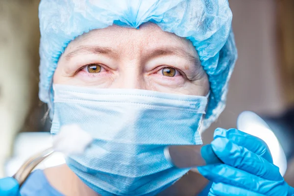 Female dentist with tools — Stock Photo, Image