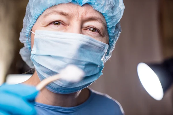 Female dentist with tools — Stock Photo, Image