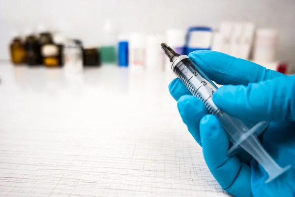 Doctors hands in blue robber gloves — Stock Photo, Image