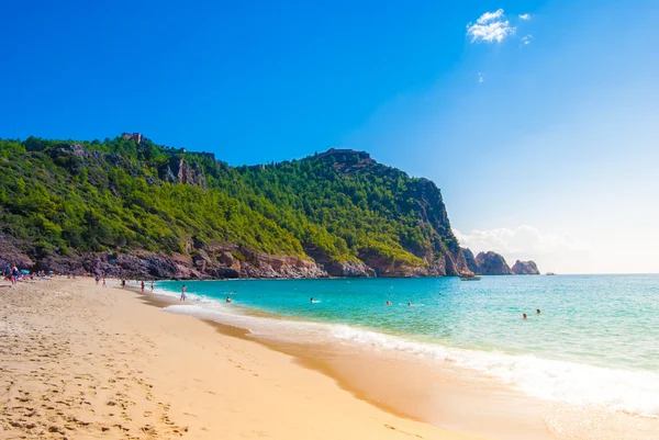 Beach of Cleopatra with sea and rocks of Alanya peninsula, Antal