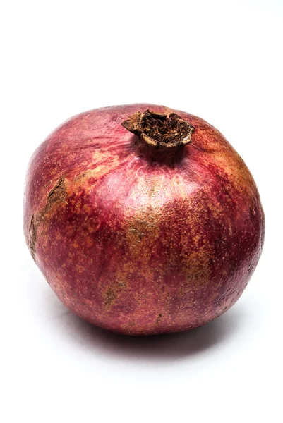 Granátové jablko na bílém pozadí — Stock fotografie