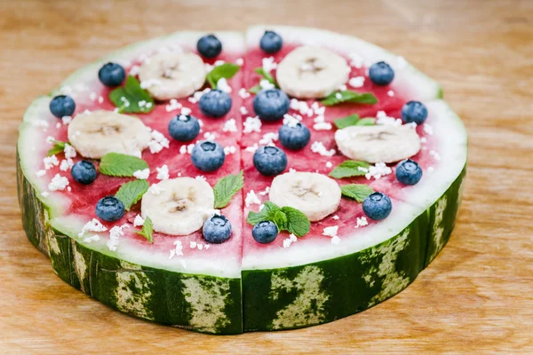 Watermelon pizza on wood — Stock Photo, Image