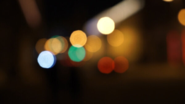 Defocused night traffic lights, blurred abstract background