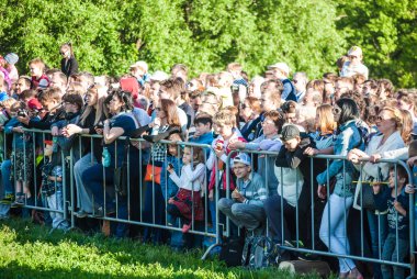 Crowd of people watching Historical reenactment of Boudicas re clipart