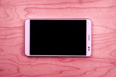 Ahşap arkaplanda tablet pc