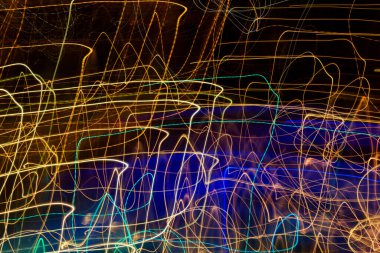 Intentional camera movement, abstract colored light scribbles