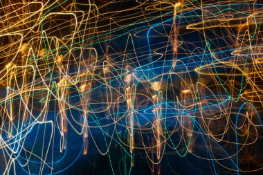 Intentional camera movement, abstract colored light scribbles