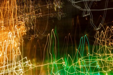 Intentional camera movement, abstract colored light scribbles