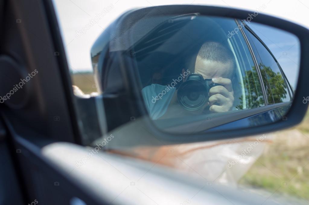 Photographer in Car Side Mirror