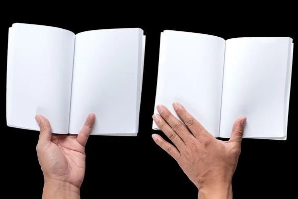 A kéz, a fekete háttér üres notebook. — Stock Fotó