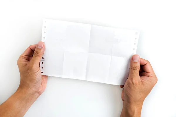 Ruka držící prázdný papír na bílém pozadí. — Stock fotografie