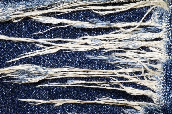 Jeans strappato trama denim per lo sfondo . — Foto Stock