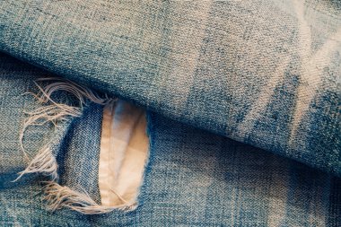 Biraz yırtık kot parçası closeup