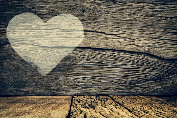 Fondo de San Valentín con corazón sobre fondo de madera grunge . — Foto de Stock