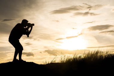 Fotoğrafçı Siluet, bir görünüm fotoğrafı çek