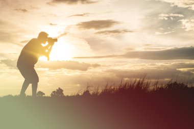 Fotoğrafçı Siluet, bir görünüm fotoğrafı çek