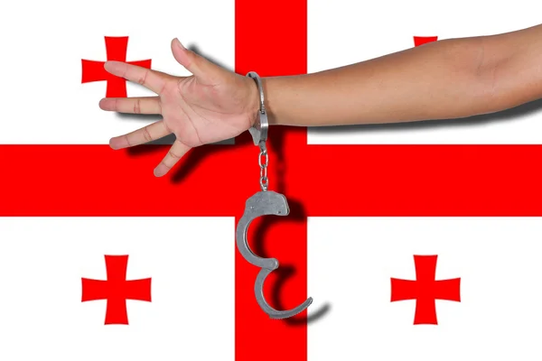 Handschellen Mit Hand Auf Georgien Fahne — Stockfoto