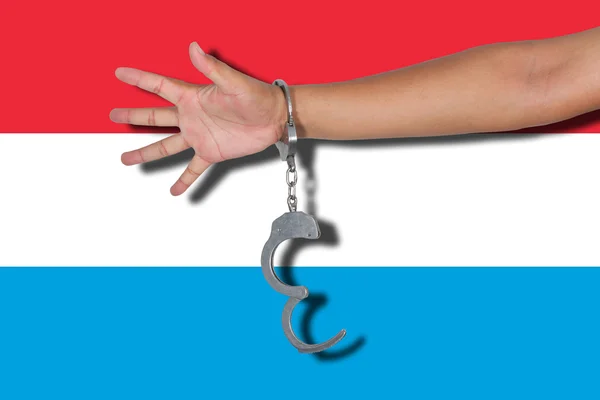 Kajdanki Ręki Flagi Luksemburga — Zdjęcie stockowe