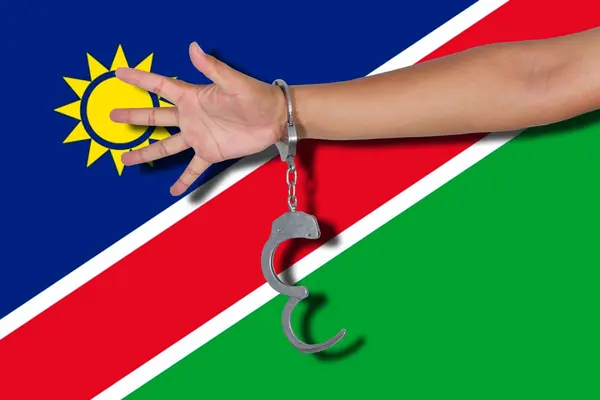 Χειροπέδες Χέρι Για Σημαία Ναμίμπια — Φωτογραφία Αρχείου