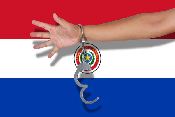 パラグアイ国旗の手で手錠 — ストック写真