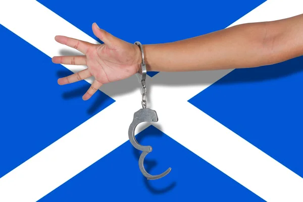Handboeien Met Hand Vlag Van Schotland — Stockfoto