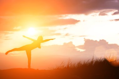 Silhouette of Outdoor Yoga on nature clipart