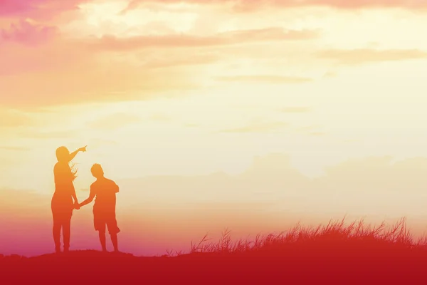 Mother Encouraged Her Son Outdoors Sunset Silhouette Concept — Stock Photo, Image