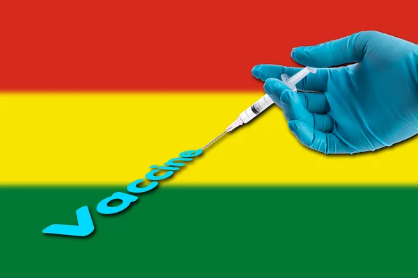 Hand Een Blauwe Handschoen Bedrijf Spuit Injecteren Vaccin Tekst Bolivia — Stockfoto