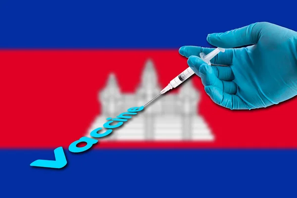 Hand Een Blauwe Handschoen Bedrijf Spuit Injecteren Vaccin Tekst Cambodja — Stockfoto