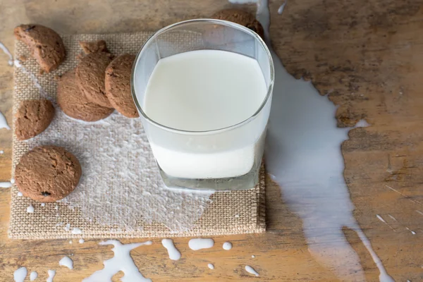 Top View Sweet Chocolate Cookies Milk Splash — Stock Photo, Image