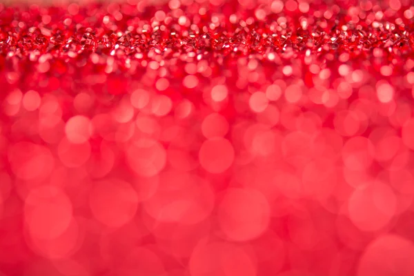 Bokeh rojo vacaciones texturizado decoraciones de Navidad fondo — Foto de Stock