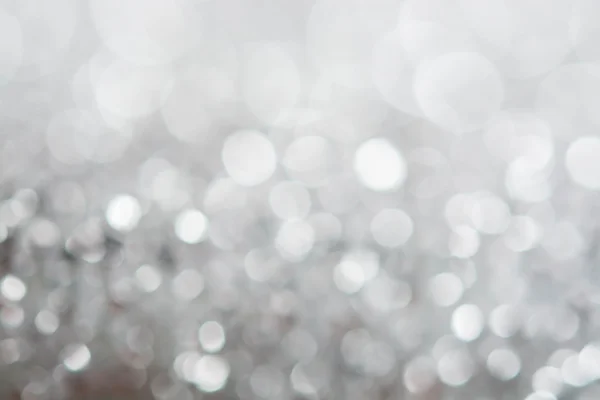 Abstracto plata blanco bokeh luces fondo — Foto de Stock