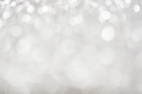 Streszczenie srebrny biały bokeh świateł tło — Zdjęcie stockowe