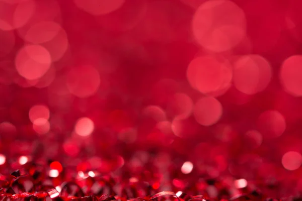 Vermelho bokeh feriado texturizado Natal decorações fundo — Fotografia de Stock