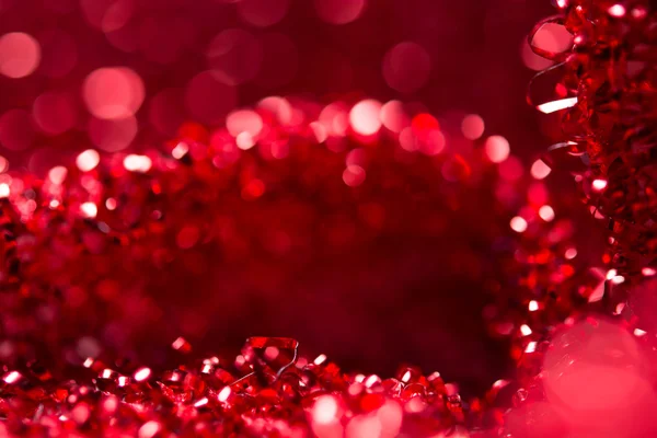 Red bokeh holiday textured Christmas decorations background — Stock Photo, Image