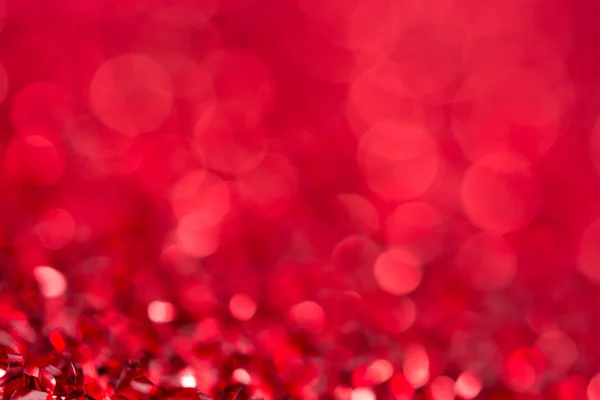 Vermelho bokeh feriado texturizado Natal decorações fundo — Fotografia de Stock