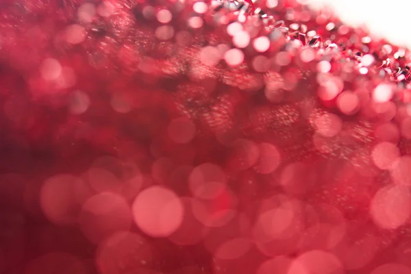 Bokeh rojo vacaciones texturizado decoraciones de Navidad fondo — Foto de Stock