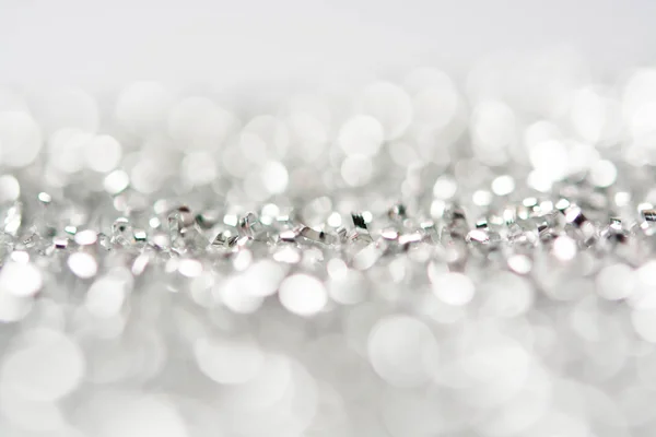 Abstract silver white bokeh lights background Stock Image