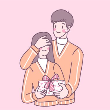 Gözleri bağlı bir kadın olan bir adam bir hediye kutusuna şaşırır..