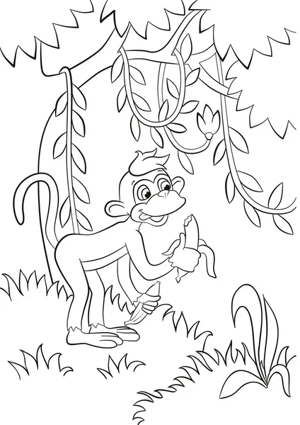 Küçük sevimli maymun ormanda muz yiyor. Onun gülümseyen ve mutlu