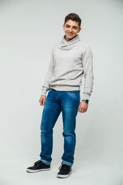 Man tröja och jeans vit bakgrund — Stockfoto