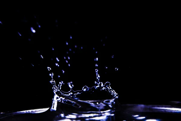 Water splashes isolated on black — Stock Photo, Image